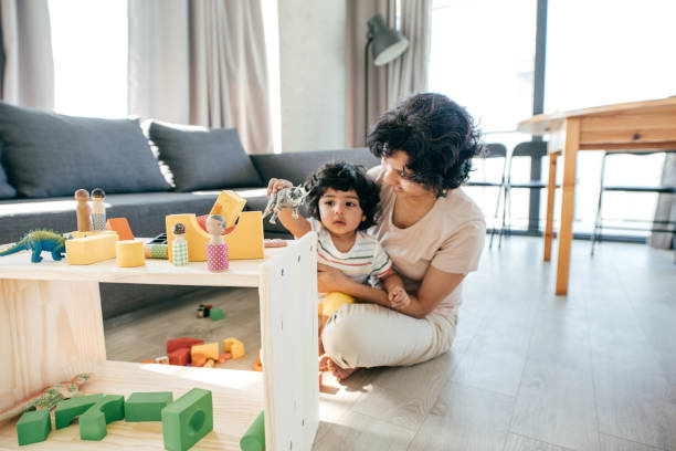 istock Toddler playing animal toy 953970720
