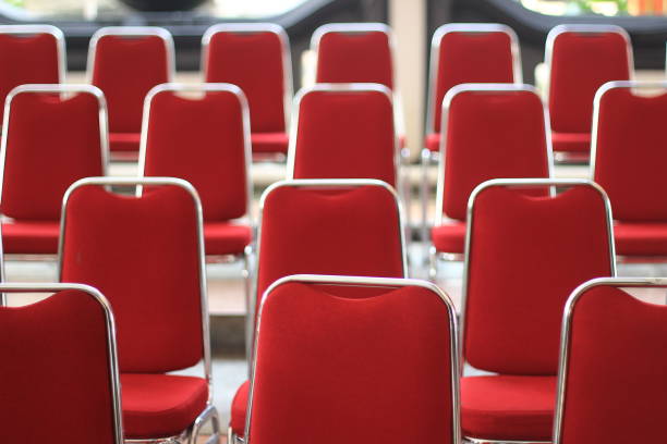 istock empty red seats front of outdoor stage 953971434