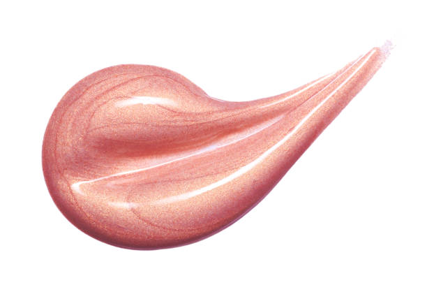 istock Lip gloss sample isolated on white. Smudged pink lipgloss. 953980706