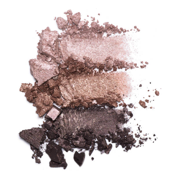 istock Set of eyeshadow sample isolated on white background. Crushed brown eyeshadow 953980930