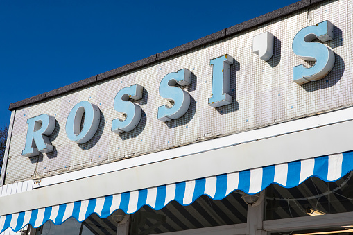 Southend-on-Sea, Essex - April 5th 2018: The logo above the Rossis Ice Cream Parlour at Westcliff on the Southend seafront in Essex, UK, on 5th April 2018.
