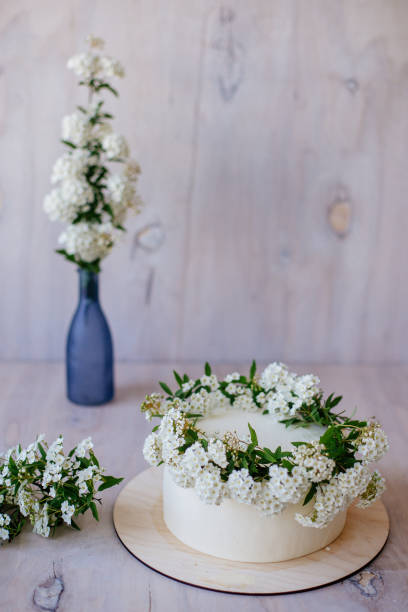 istock Vanilla cake with floral decoration. 953994254