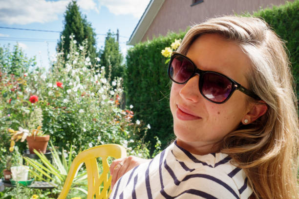 Close-up of woman relaxing at garden