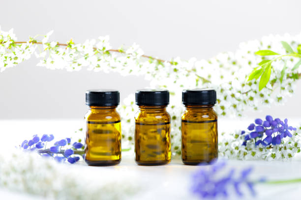 istock Aroma bottles and flowers 954000720