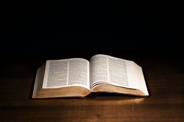 istock The Holy Bible on a desk 954000806