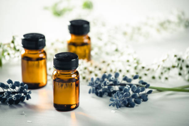 istock Aroma bottles and flowers 954003140