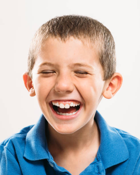 istock Portrait of a little boy laughing 954004430