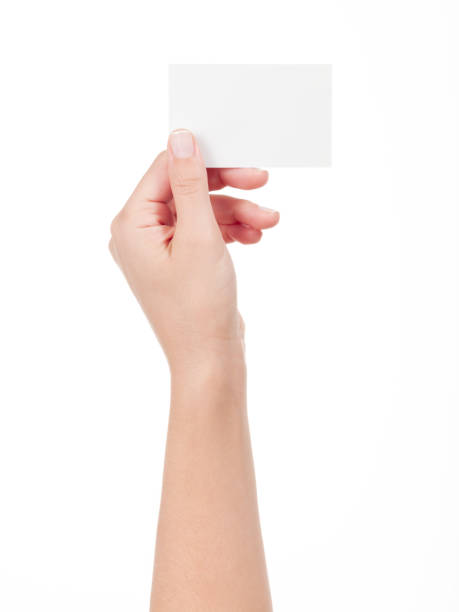 istock Woman Hand holding an empty business card 954007060