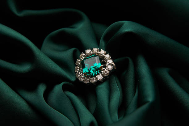 Ring with diamonds and ruby on white background.