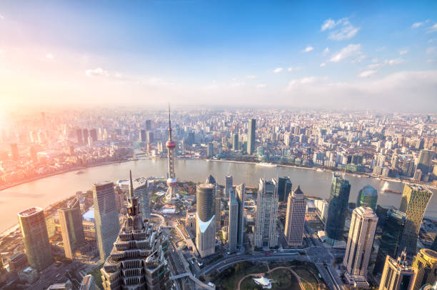 Shanghai skyline and cityscape at sunset Shanghai skyline and cityscape at sunset prosperity photos stock pictures, royalty-free photos & images