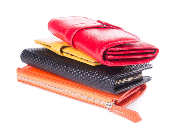 istock wallet. woman wallet on background 954018906