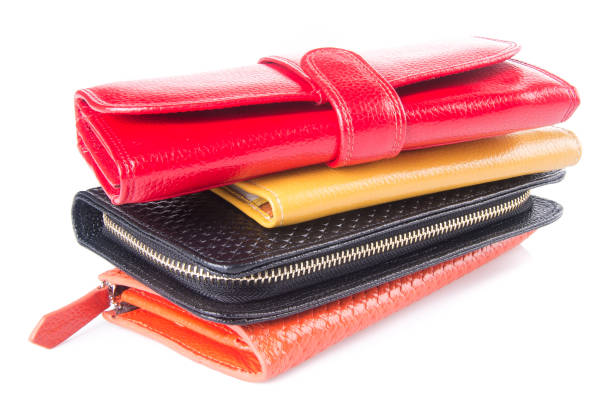 istock wallet. woman wallet on background 954018916