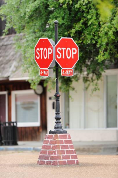 istock Four way stop sign in small town 954022902
