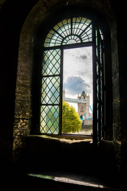 istock Old window inside a stone building in London, England 954028014