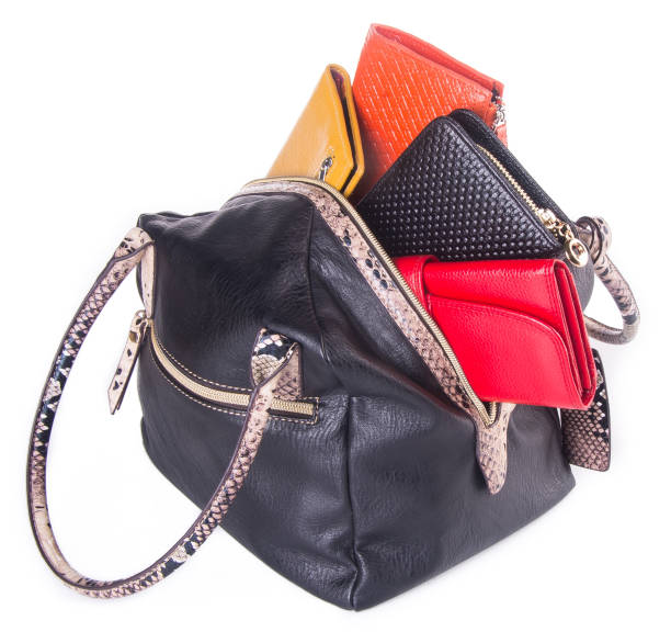 istock bag. women bag on background 954034350