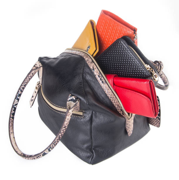 istock bag. women bag on background 954034374