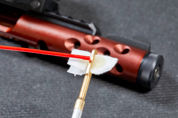 istock Dropping Lubricating Gun Oil on Cotton Patch 954043362