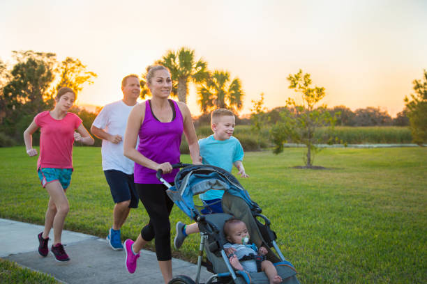 Family jogging and exercising outdoors together