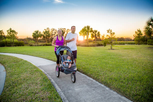 istock Couple exercising and jogging together at the park 954052200