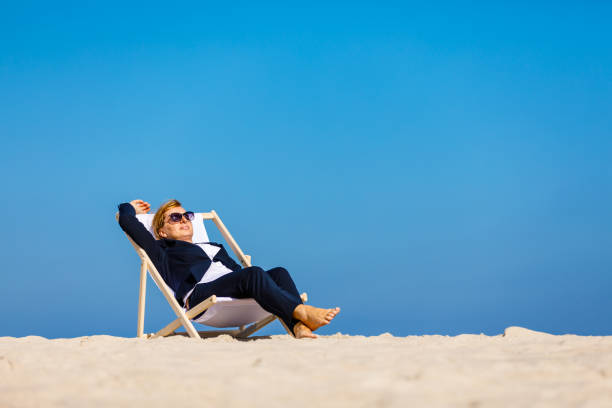 istock Woman relaxing on beach 954074626