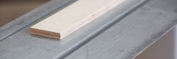 istock Wooden bars lying in a row closeup background 954074836