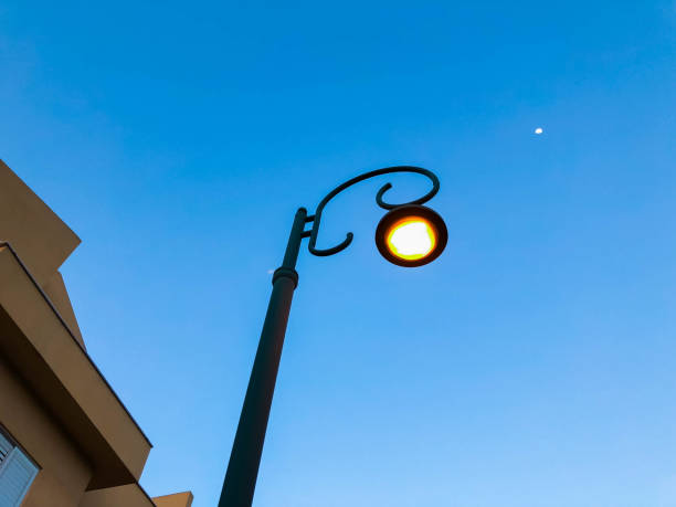 istock Bright lantern against the blue sky. Close-up 954079700
