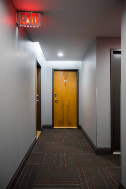 Exit Sign In Hall Hallway With Exit Sign Stock Photos, Pictures & Royalty-Free Images ...