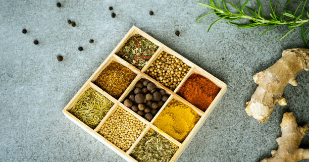 istock A collection of fresh spices on a gray stone table 954083040