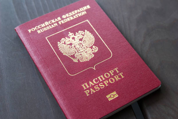 istock Russian Passport on wooden table. Close up 954083502