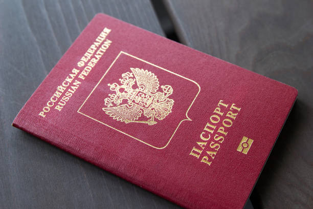 istock the one russian passport on wooden surface 954083546