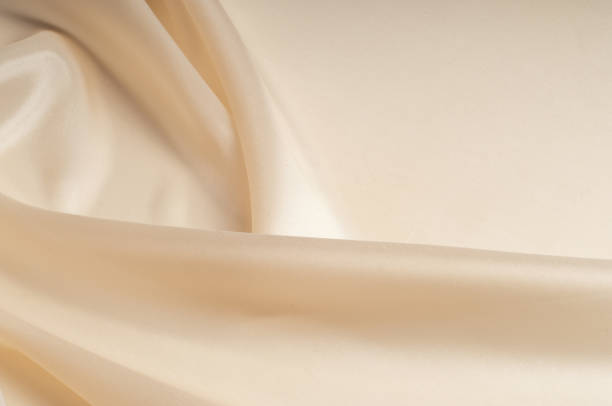 istock tissue, textile, cloth, fabric, material, texture. beige color 954084176