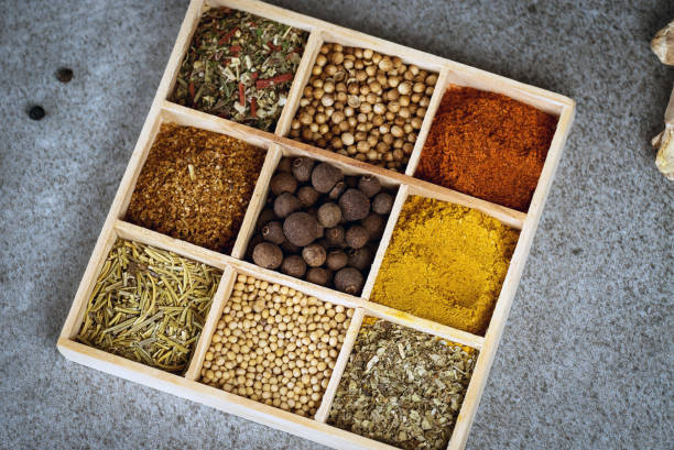 istock A collection of fresh spices on a gray stone table 954084222