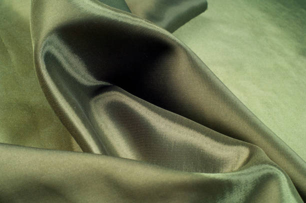 istock Fabric color of olives. olivaceous.  texture 954084342