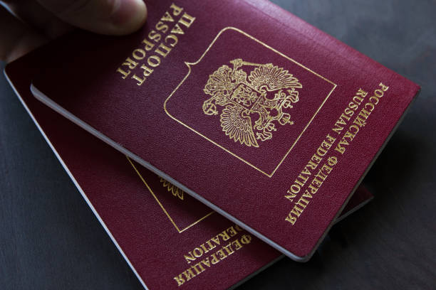istock Two Red Russian passport to travel. Closeup. 954084482