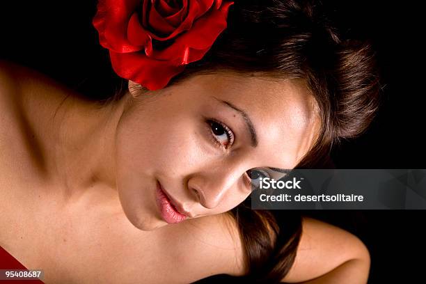 Pretty Model With Red Flower In Her Hair Stock Photo - Download Image Now - Adult, Beautiful People, Beautiful Woman