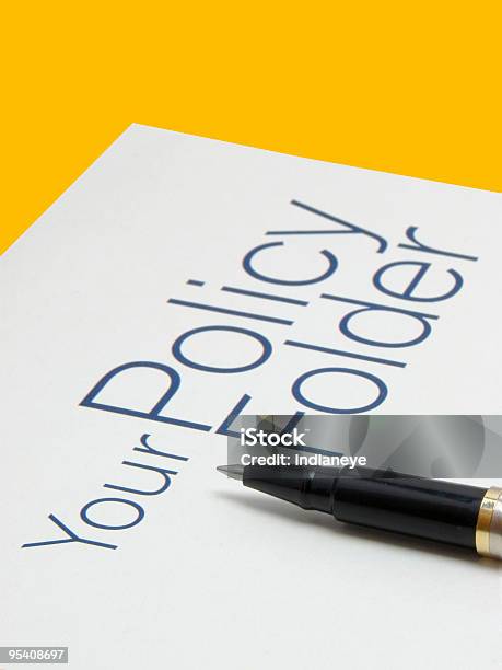 Policy Folder Stock Photo - Download Image Now - Security, Yellow Background, Ballpoint Pen