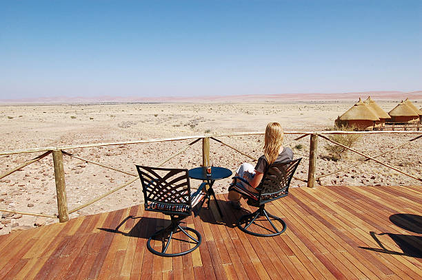 Woman look at the desert stock photo