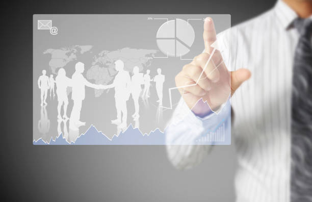 istock businessman with financial symbols coming 954089830