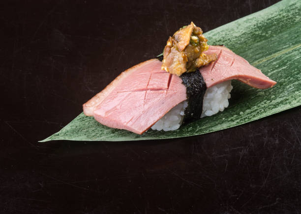 istock japanese cuisine. sushi on background 954093674