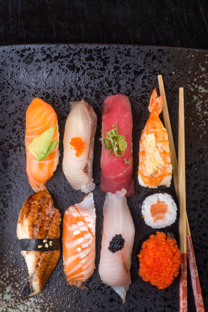 istock japanese cuisine. sushi on background 954093958
