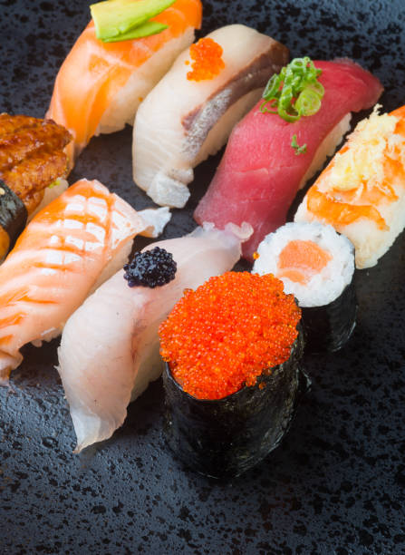istock japanese cuisine. sushi on background 954093972