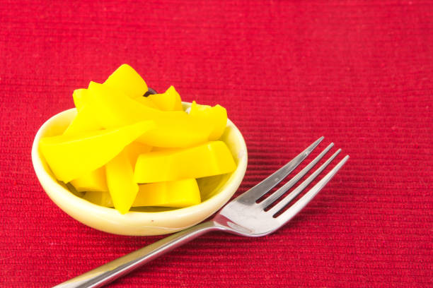 istock preserved mango fruits Snack on Background 954097982