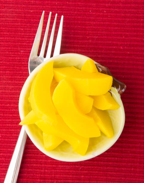 istock preserved mango fruits Snack on Background 954097992