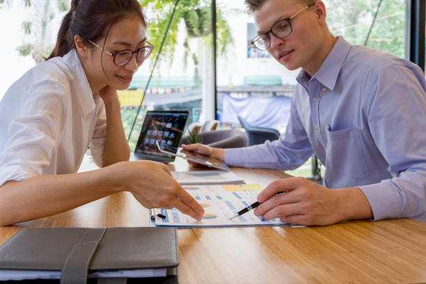 istock business people meeting brainstorming and discussing project together in office, teamwork concept 954110114