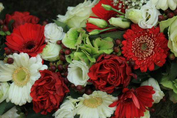 istock Red and white wedding flowers 954114872