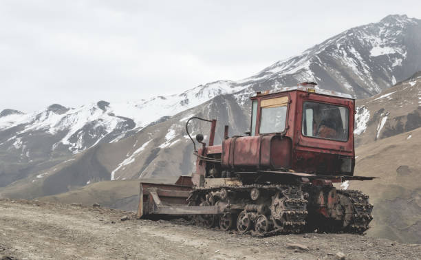 istock Old bulldozer in a mountainous area 954115402