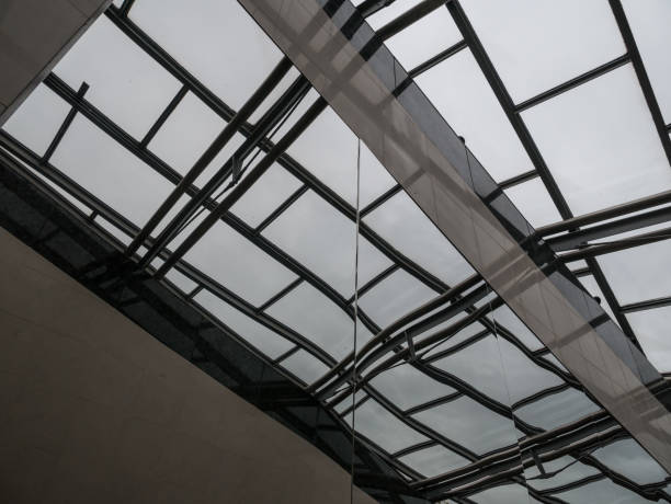 istock The glass architecture in city against a sky 954120546