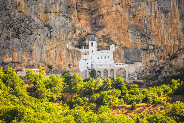 Montenegro.  Monastery Ostrog in the mountains Montenegro, Danilovgrad. July 31, 2017. Monastery Ostrog in the mountains, a functioning Serbian Orthodox monastery, located at an altitude of about 900 m above sea level. Founded in the XVII century monastery stock pictures, royalty-free photos & images