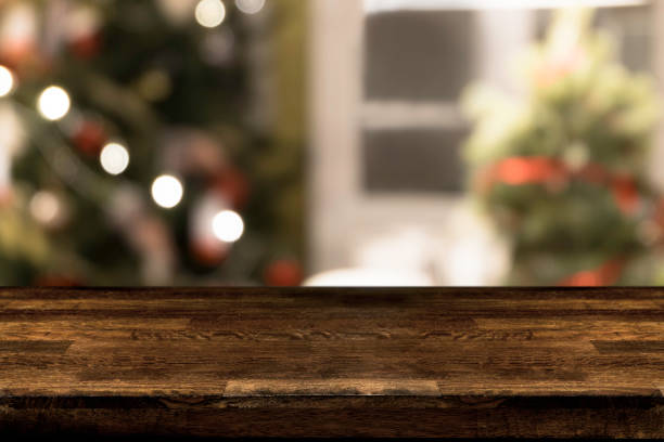 istock Christmas holiday background with empty wooden table top. 954121636