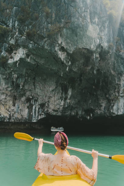 istock Woman kayaking in Halong Bay 954121876